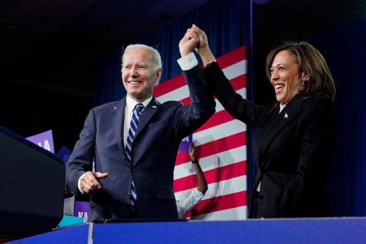 FILE PHOTO: U.S. President Joe Biden and Vice President Kamala Harris stand on stage together after delivering remarks at the DNC 2023 Winter Meeting in Philadelphia, Pennsylvania, U.S., February 3, 2023. REUTERS/Elizabeth Frantz
